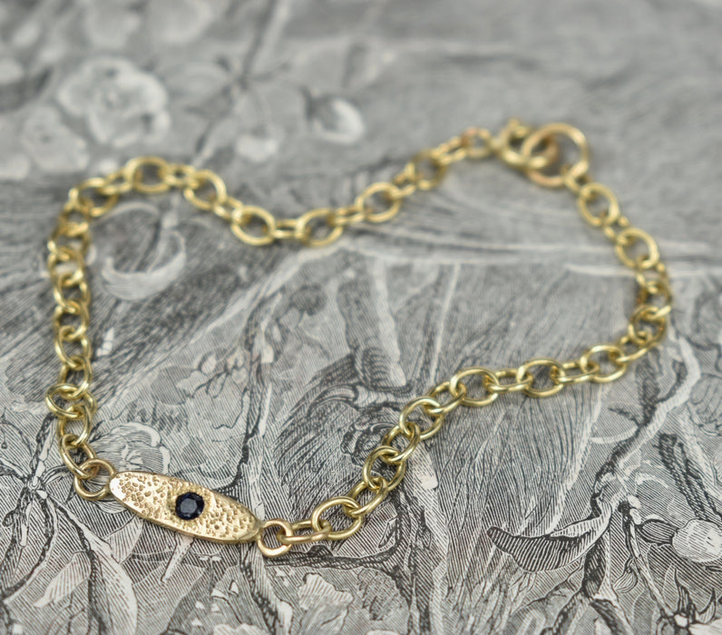 Sapphire and gold chain bracelet