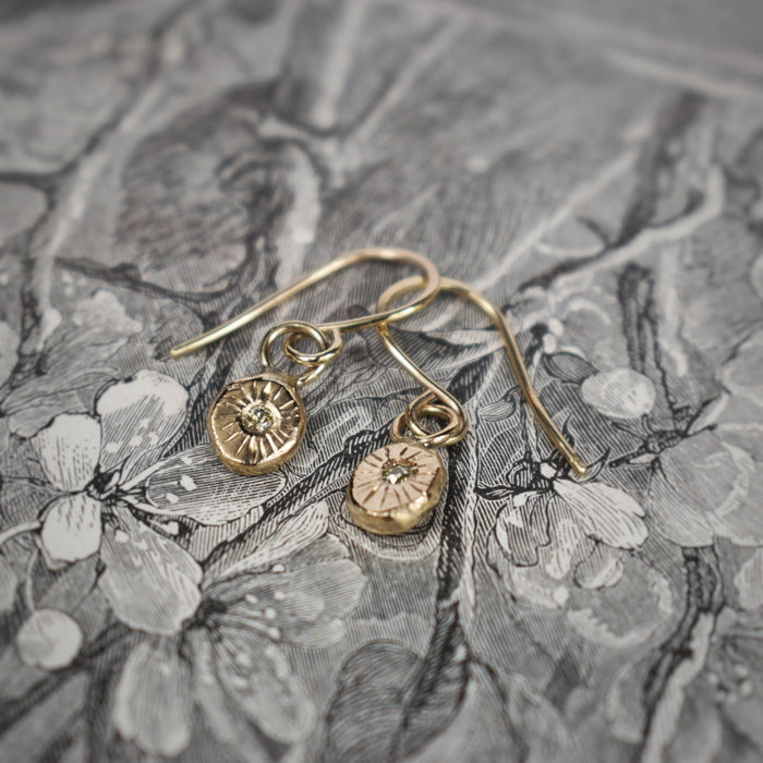 Tiny gold coin and diamond drop earrings