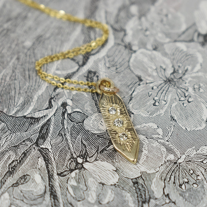 Gold and diamond drop pendant