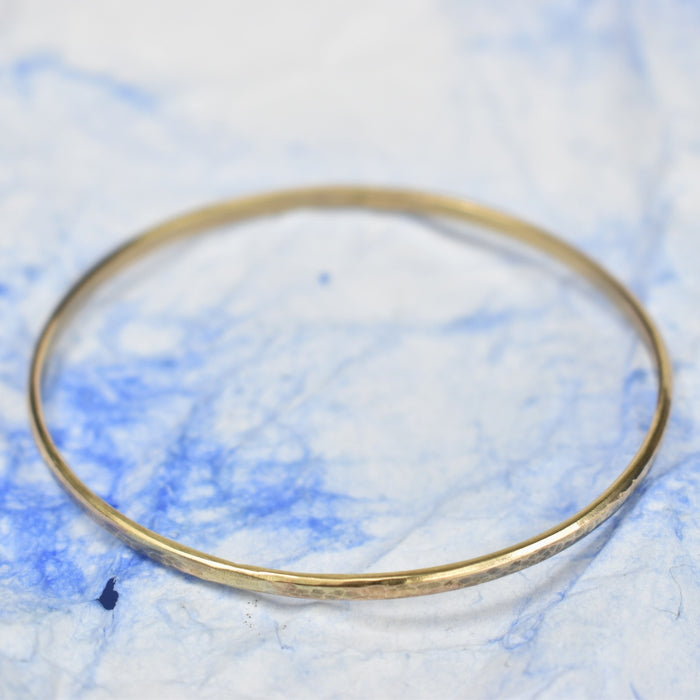 Hammered gold bangle