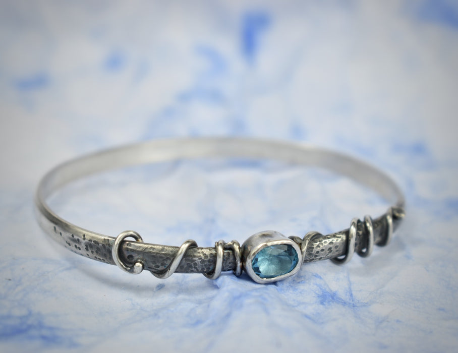 Blue topaz and silver vine bangle